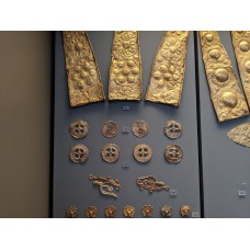 Gold leaf, rosette, and octopus ornaments